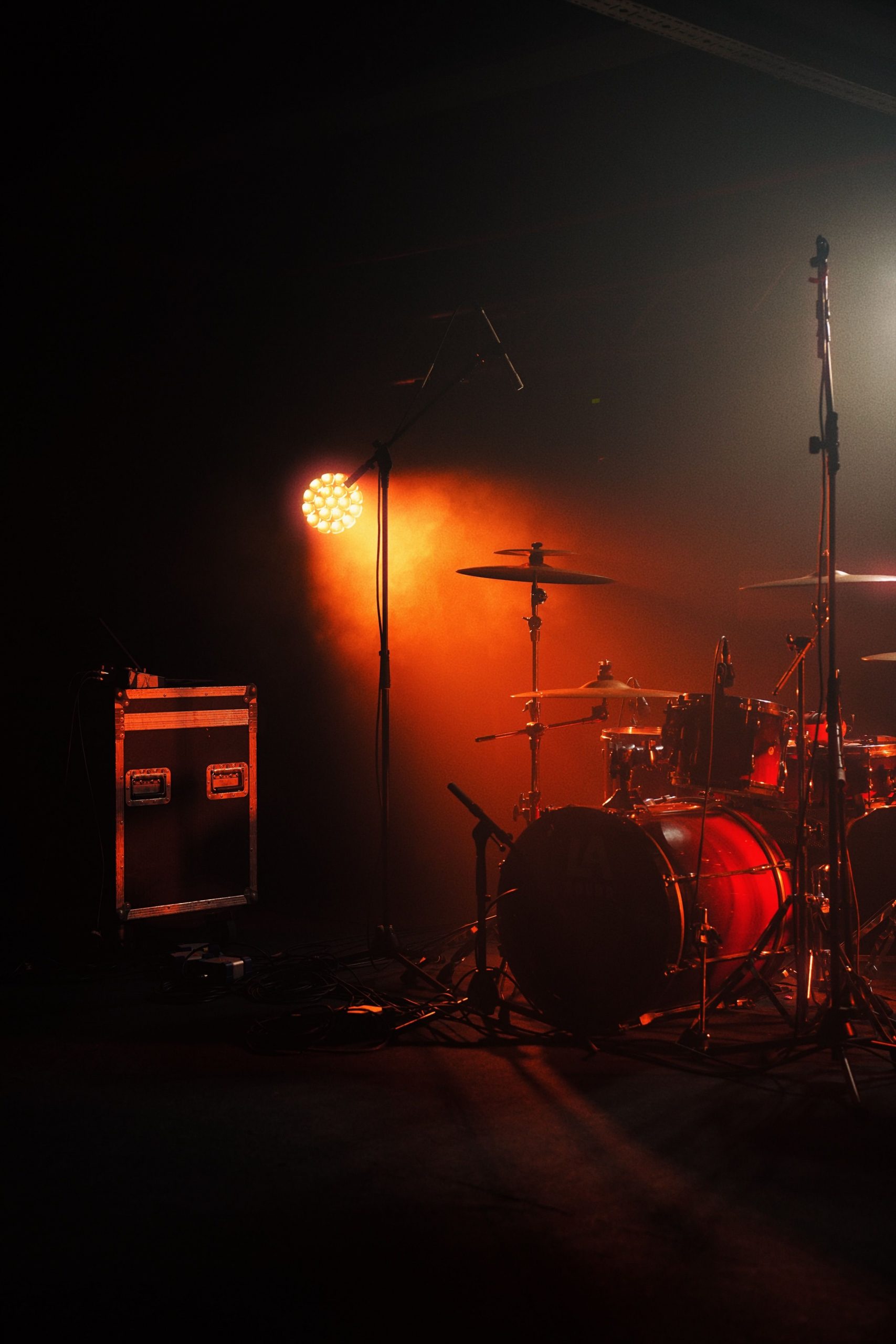 Band image onstage with low lighting